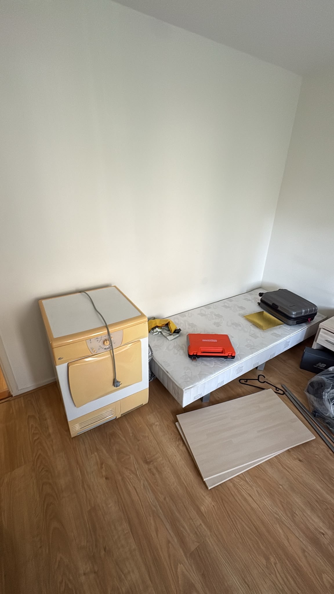Bed and appliance at a furniture collection in Leiden